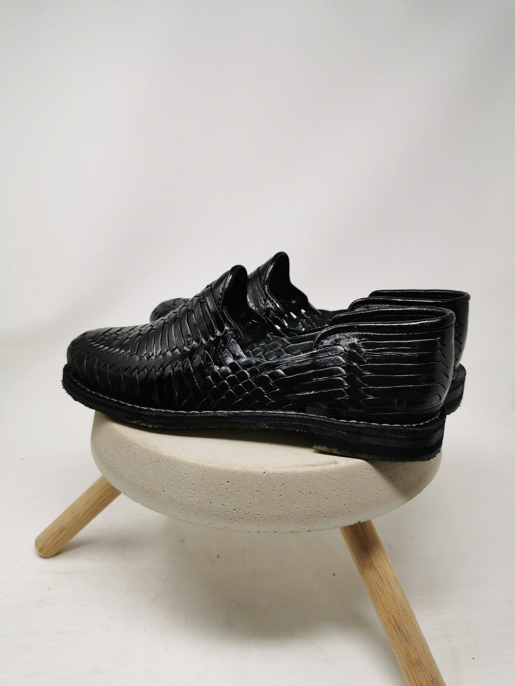 Men's black huarache sandal.