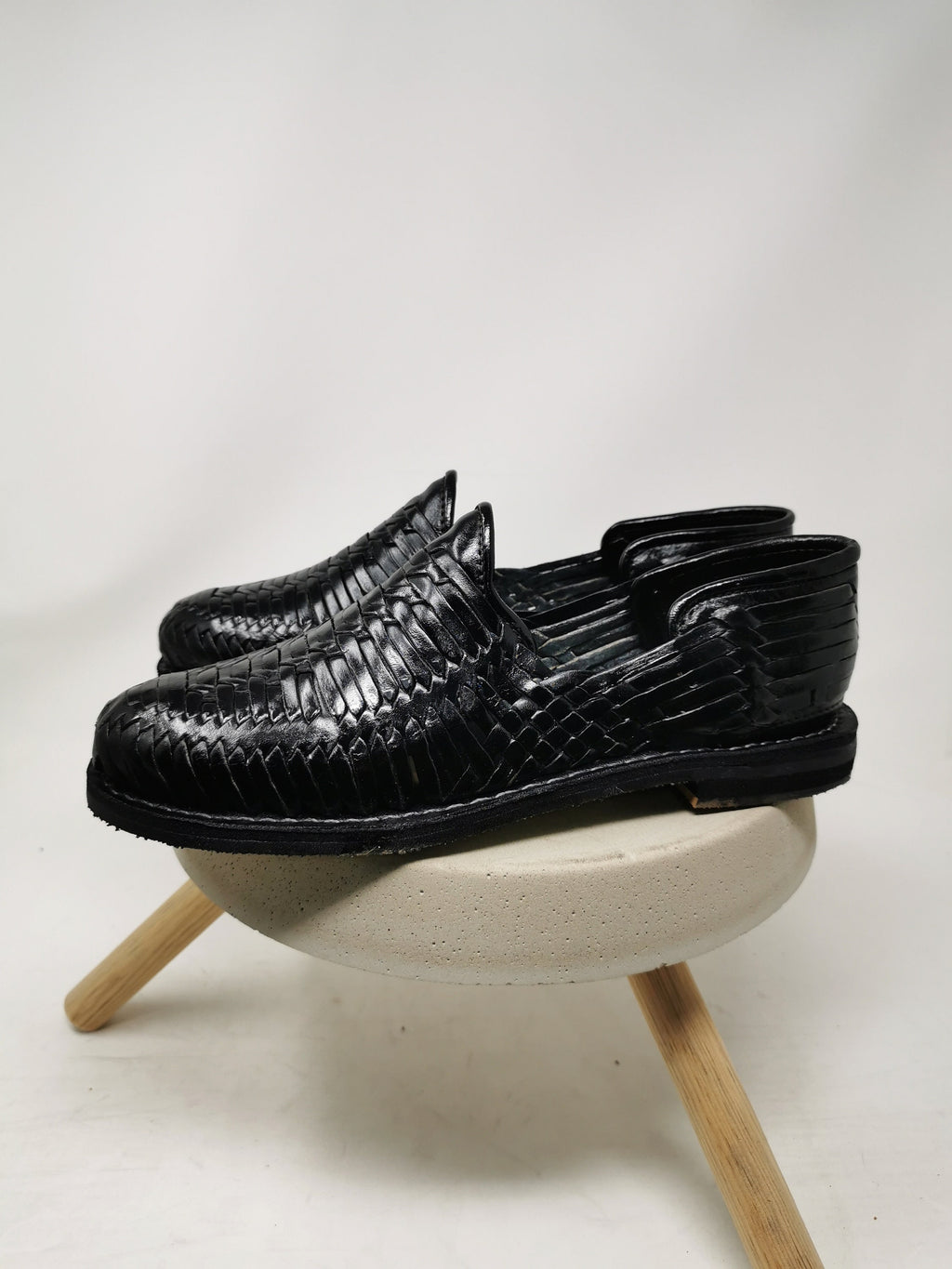 Men's black huarache sandal.