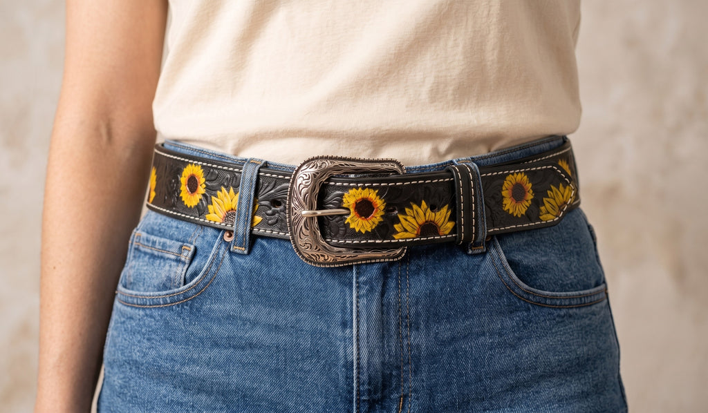 Woman wearing a black sunflower leather belt with jeans