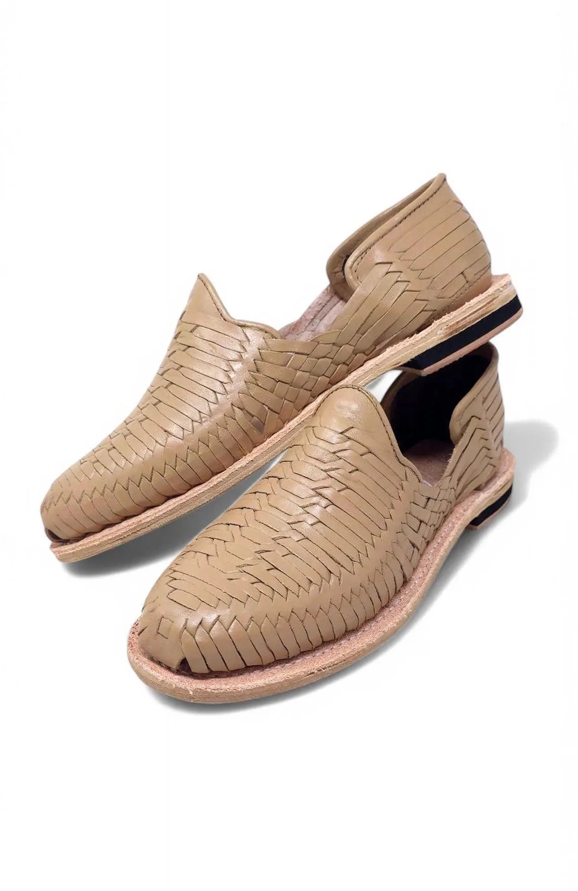 Close-up of the taupe woven leather and covered heel of women's huarache sandals