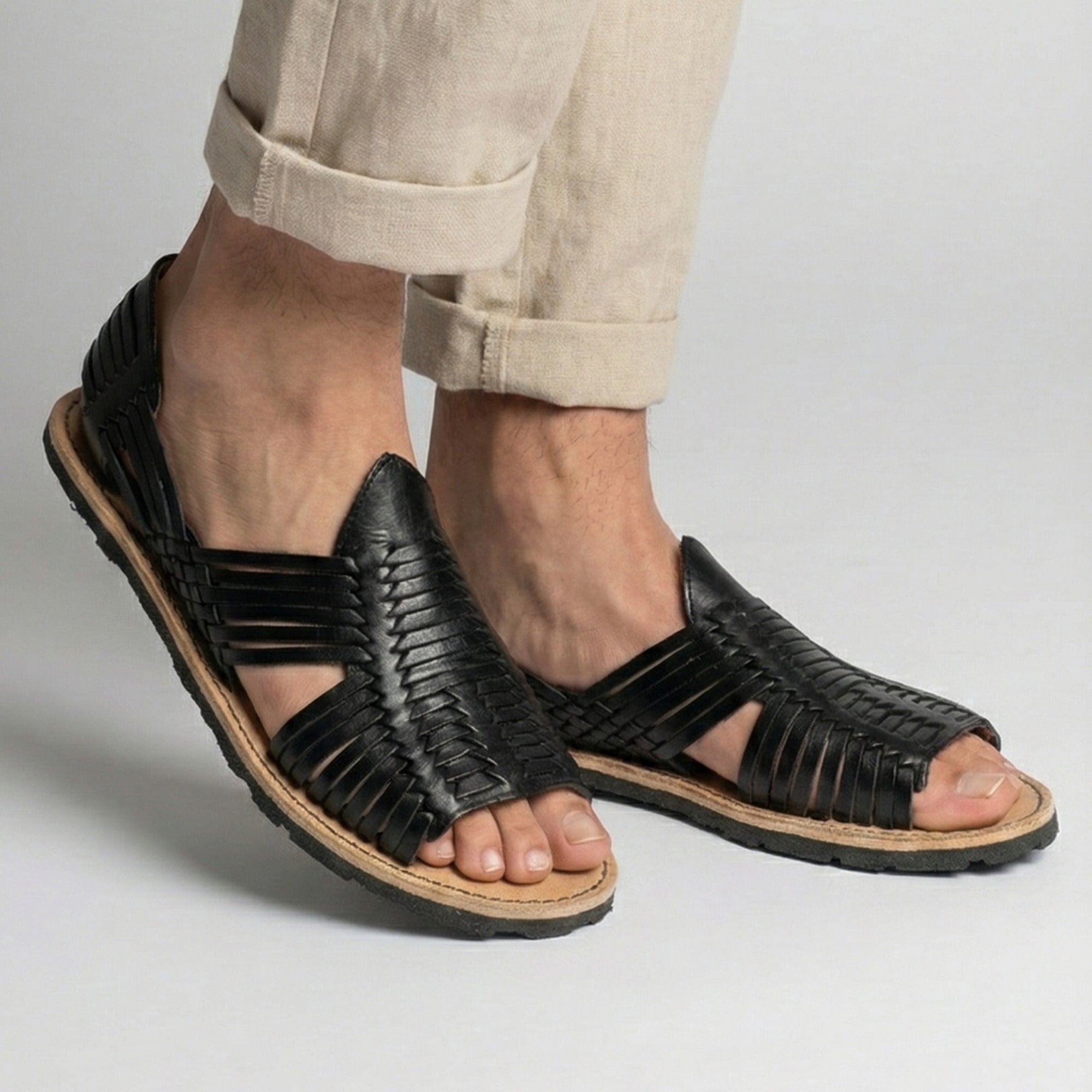 Men's Mexican leather huaraches in several colors, full side profile view of the pair