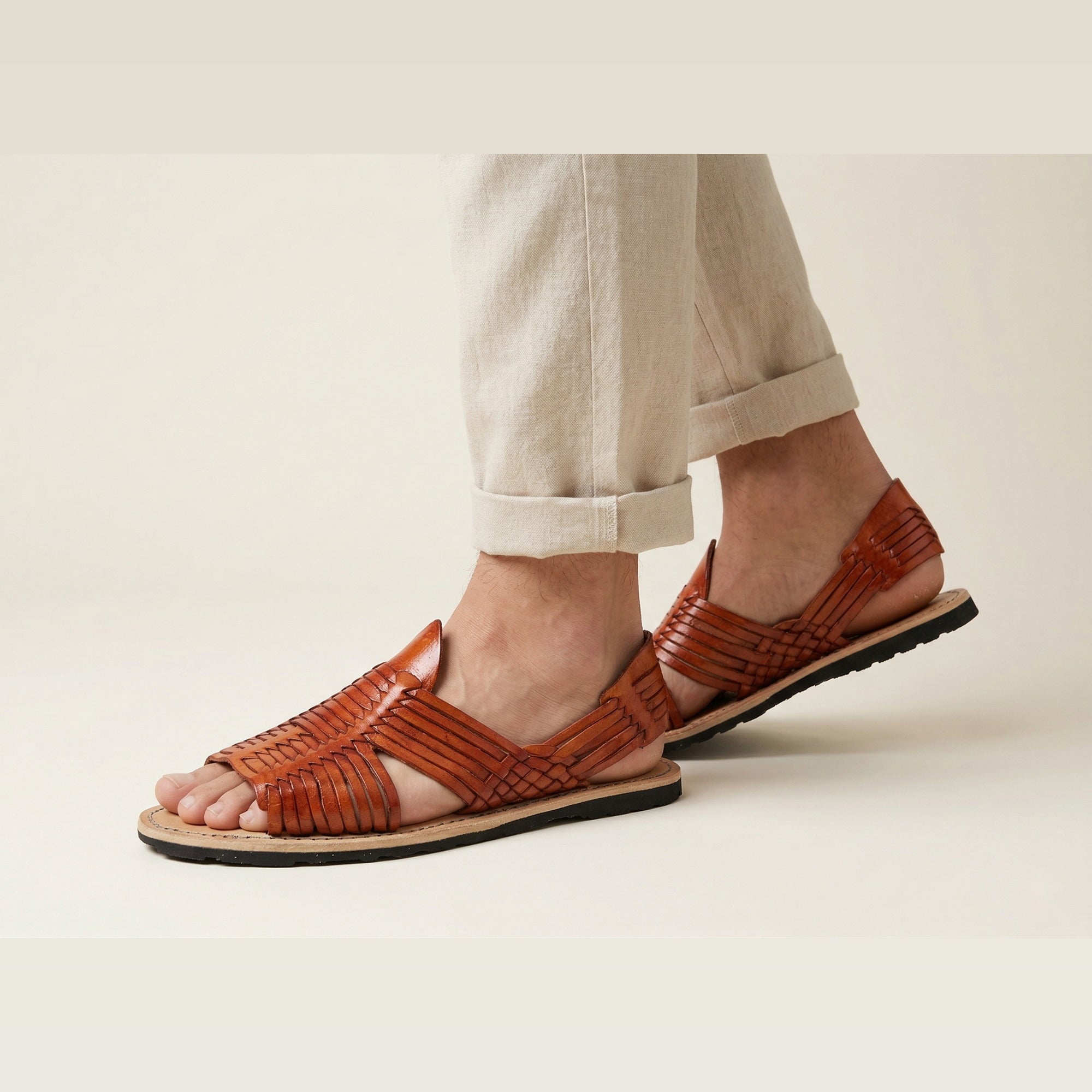 Men's Mexican leather huaraches in several colors, showing the rich natural leather tone